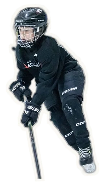 Jeune joueur en chandail noir Hockey-Académie